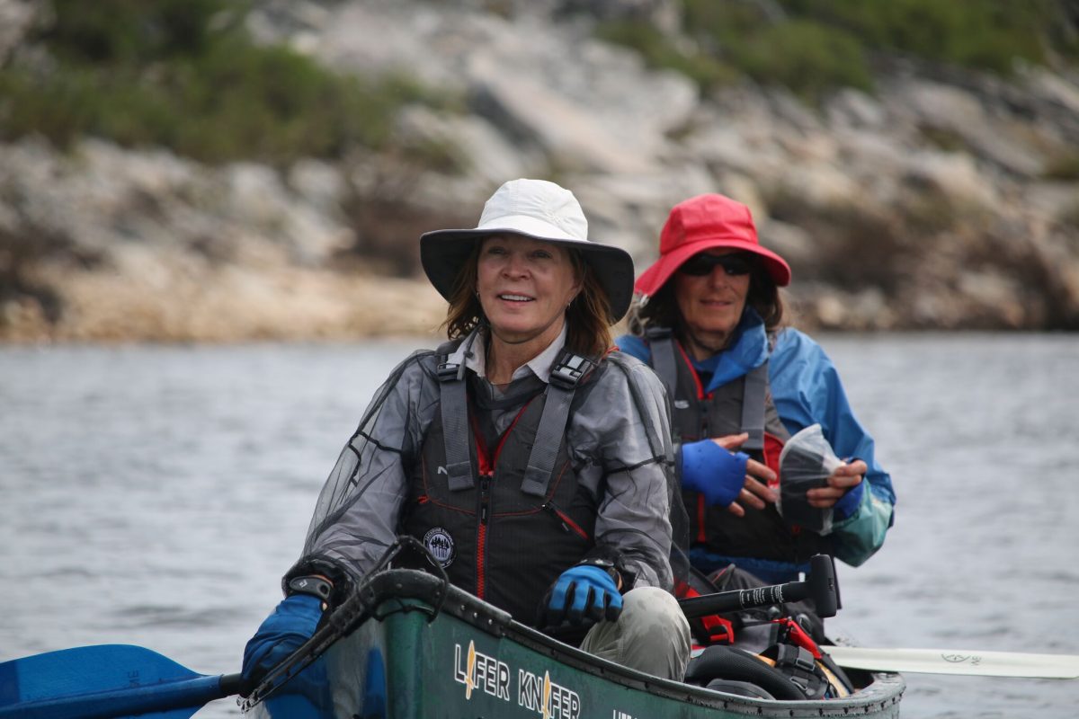 two women paddling in northern canada