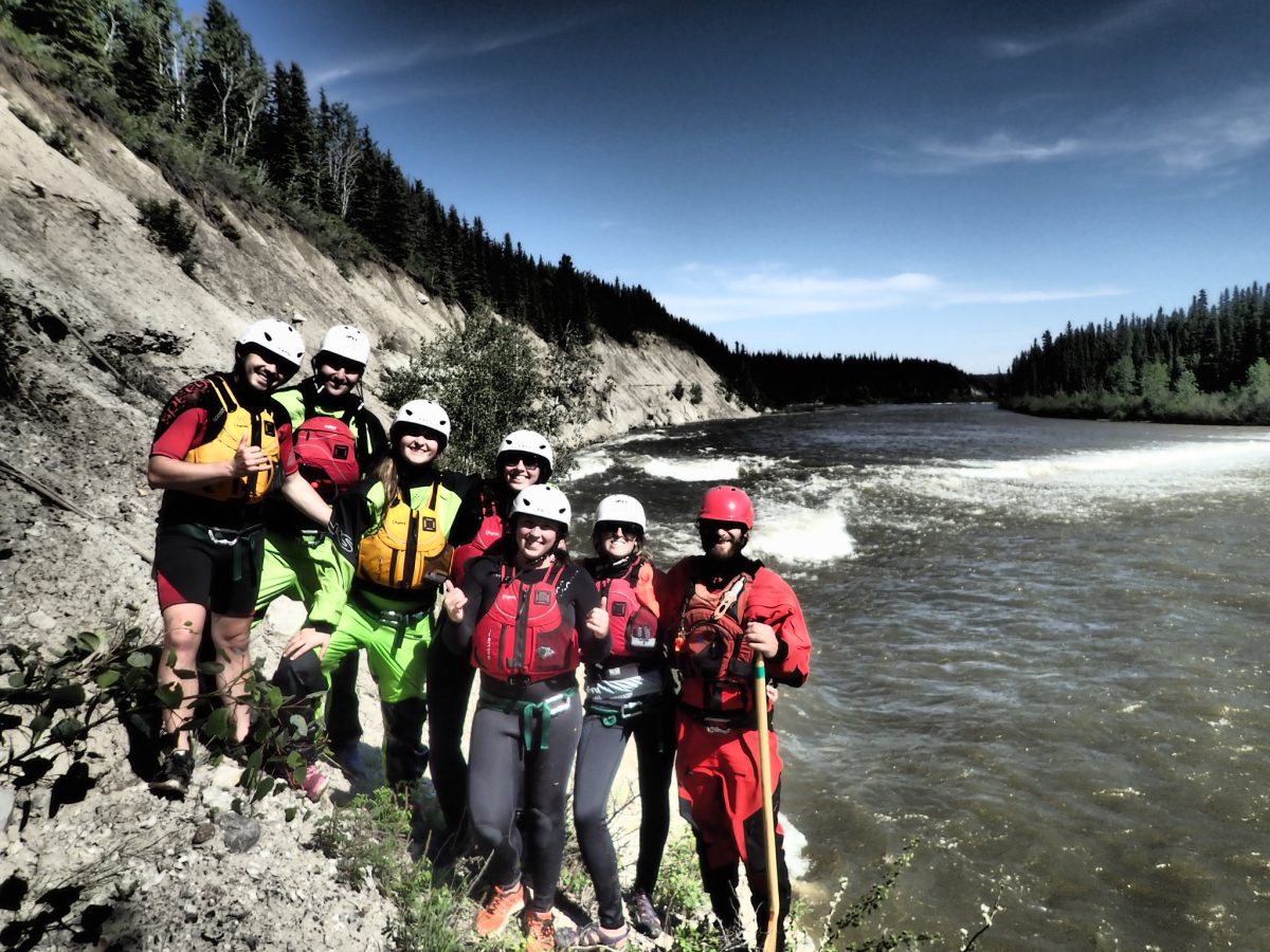 canoe expedition course northwest territories whitewater paddle group photo