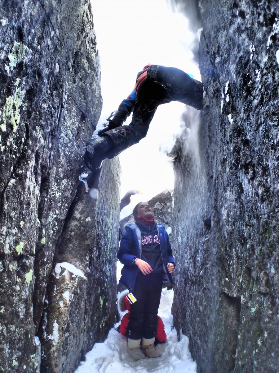 kids climbing rocks at Cameron falls