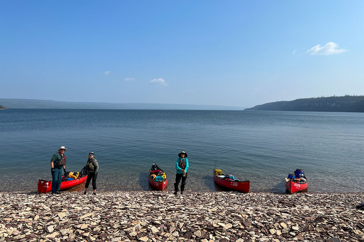 canoes on a shore on a canoe trip in canada